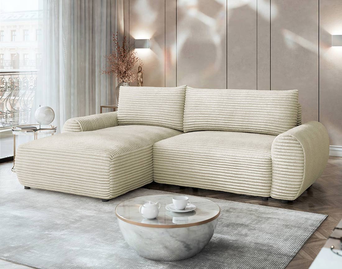 Canapé d'angle gauche 4 places convertible avec coffre en velours côtelé grosses côtes Silvano Canapé d'angle gauche 4 places convertible avec coffre en velours côtelé grosses côtes Silvano