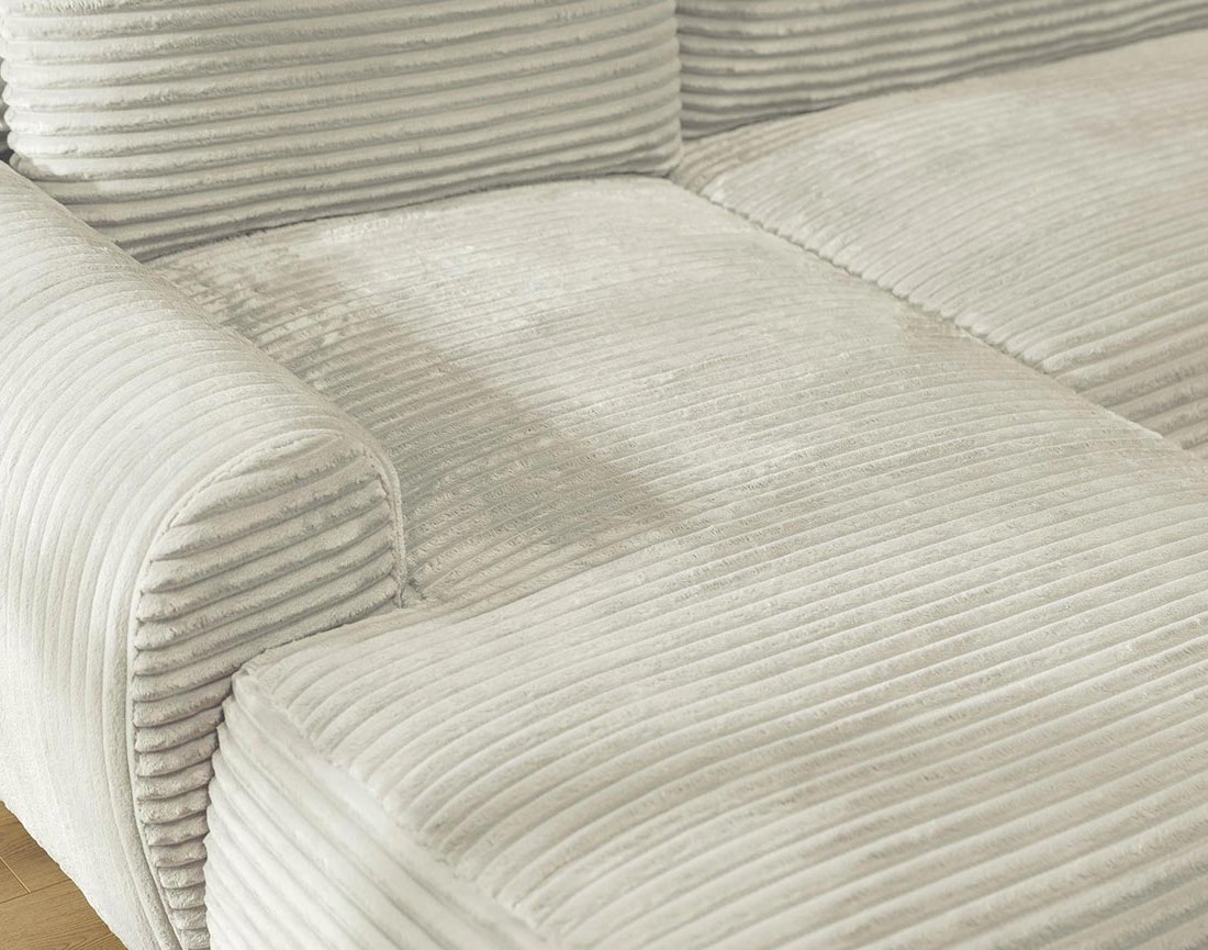 Canapé d'angle gauche 4 places convertible avec coffre en velours côtelé grosses côtes Silvano Canapé d'angle gauche 4 places convertible avec coffre en velours côtelé grosses côtes Silvano