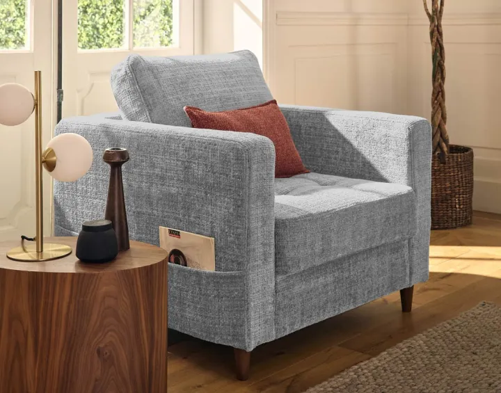 Fauteuil avec poche en velours texturé pieds en bois Anna