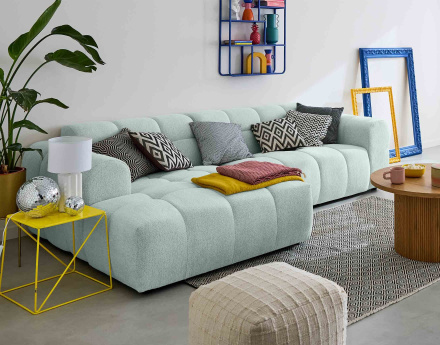 Canapé d'angle gauche 4 places en tissu texturé