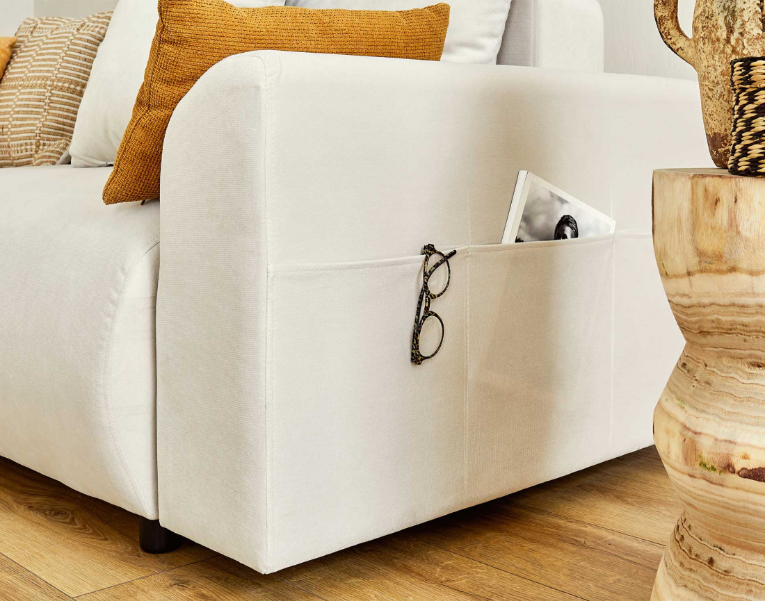 Canapé d'angle réversible convertible avec coffre et poches 4 places en velours Camélia Canapé d'angle réversible convertible avec coffre et poches 4 places en velours Camélia