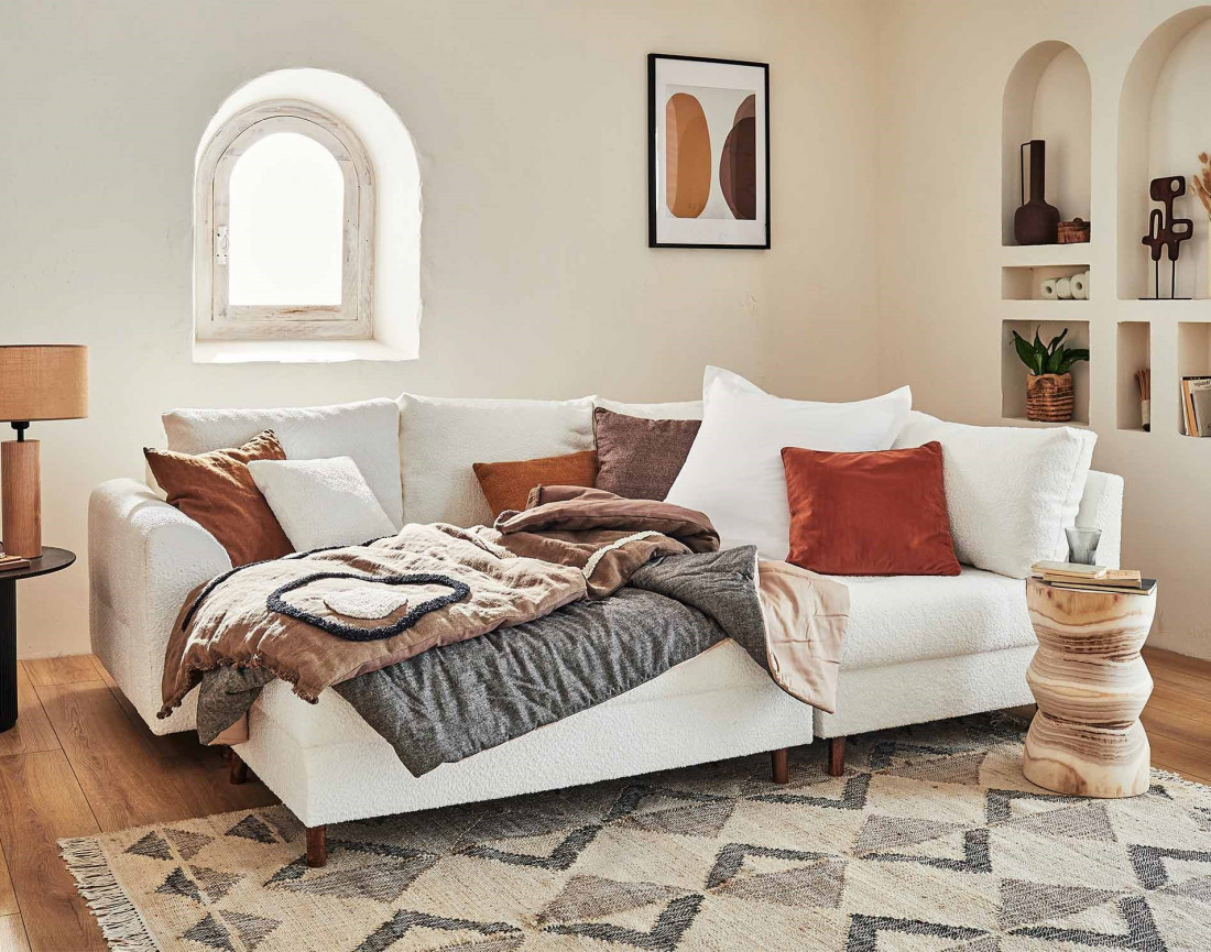 Canapé d'angle droit 4 places avec pouf d'appoint en tissu bouclette Rune