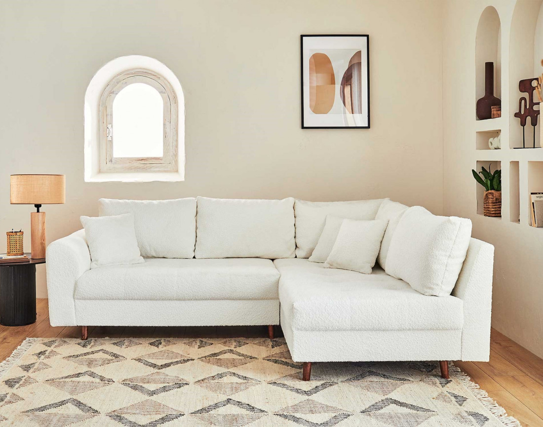 Canapé d'angle droit 4 places avec pouf d'appoint en tissu bouclette Rune