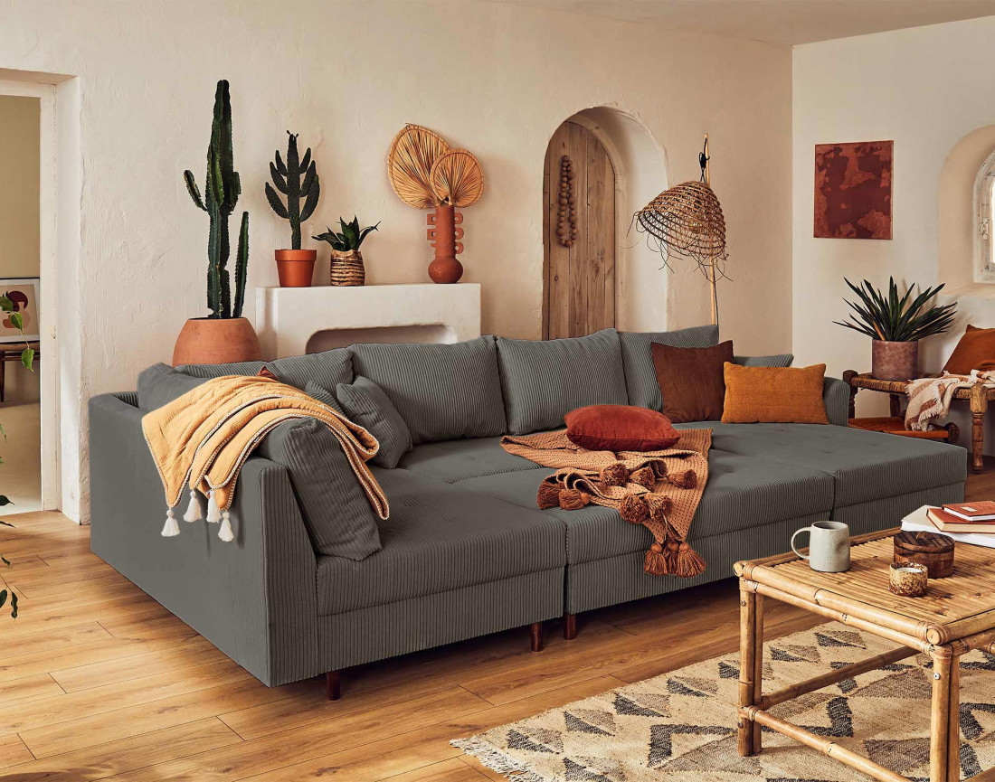 Canapé panoramique d'angle gauche 7 places avec pouf d'appoint - en velours côtelé - Rune