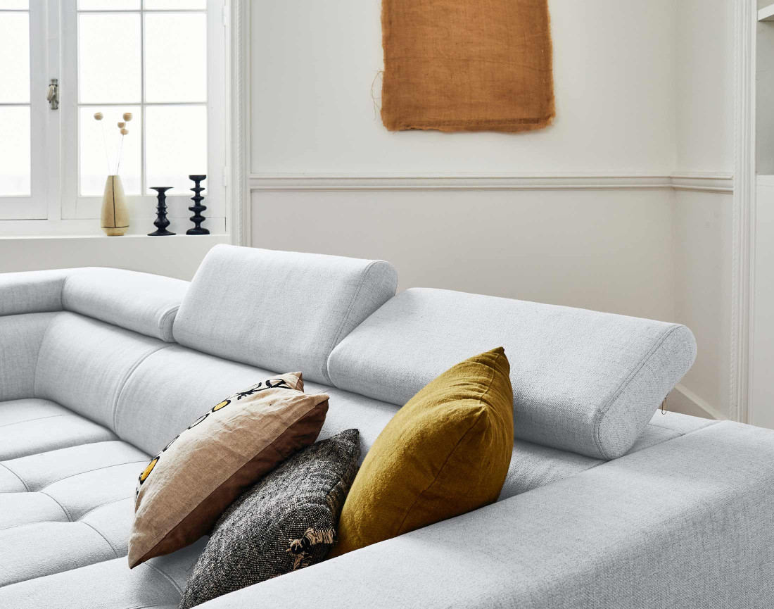 Canapé d'angle gauche 5 places convertible avec coffre et têtières en tissu Olinda