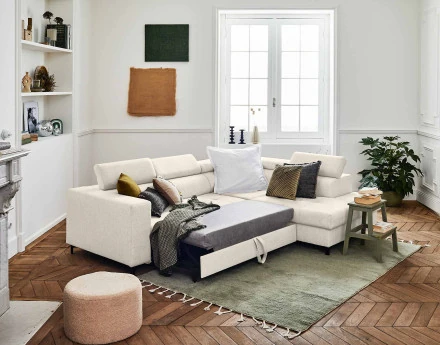 Canapé d'angle gauche 5 places convertible avec coffre et têtières réglables en tissu Olinda