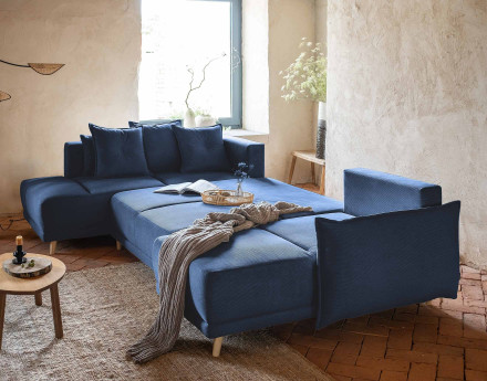 Canapé panoramique d'angle gauche 7 places convertible avec coffre en velours côtelé Lena