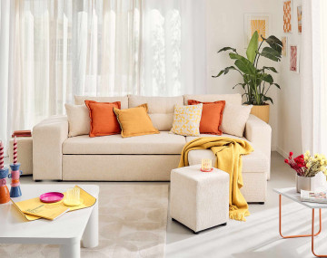 Canapé d'angle réversible 4 places convertible avec coffre, étagère et poufs en velours texturé California