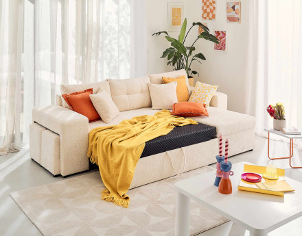 Canapé d'angle réversible 4 places convertible avec coffre, étagère et poufs en velours texturé California