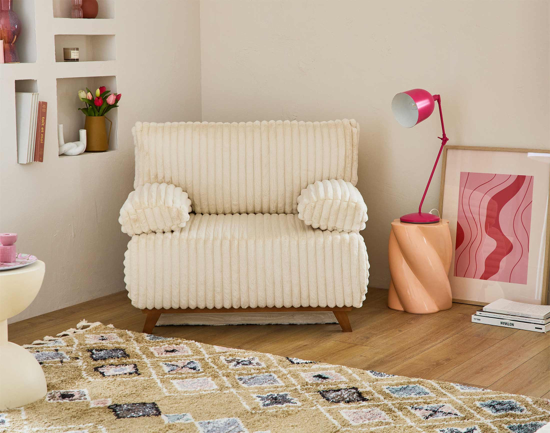 Fauteuil convertible avec coffre en fausse fourrure côtelée Cristal