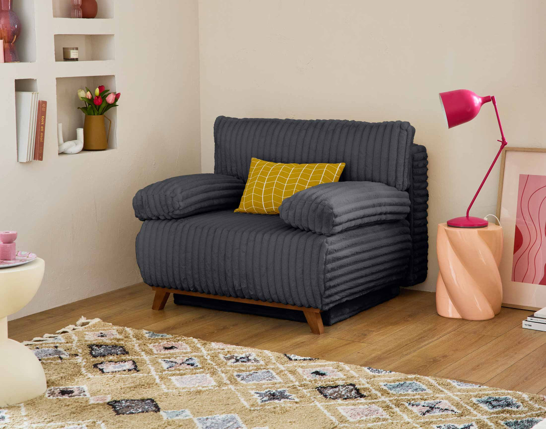 Fauteuil convertible avec coffre en fausse fourrure côtelée Cristal