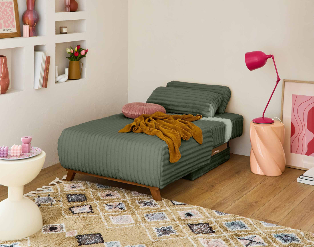 Fauteuil convertible avec coffre en fausse fourrure côtelée Cristal