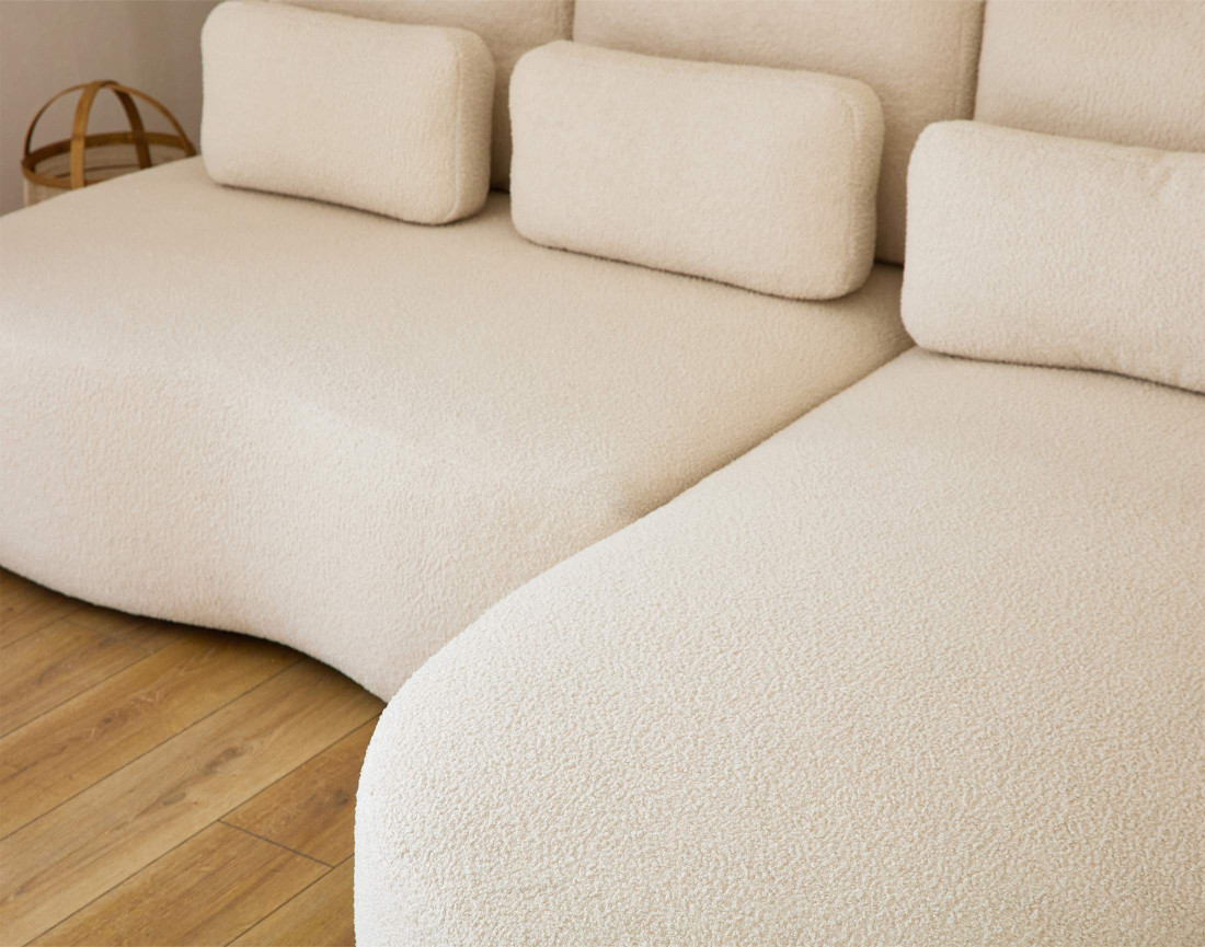 Canapé d'angle droit 4 places convertible avec coffre en tissu bouclette Mahina