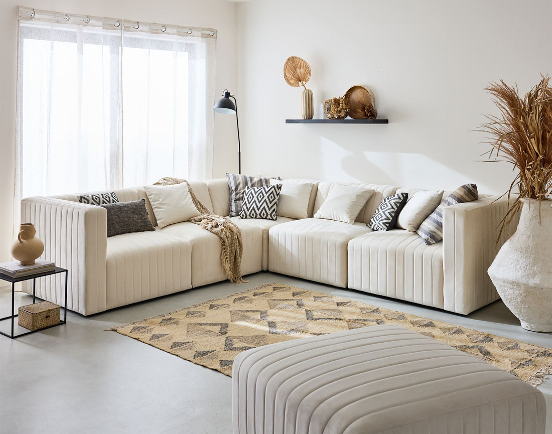 Canapé modulable d'angle réversible 6 places avec pouf d'appoint en velours Nova