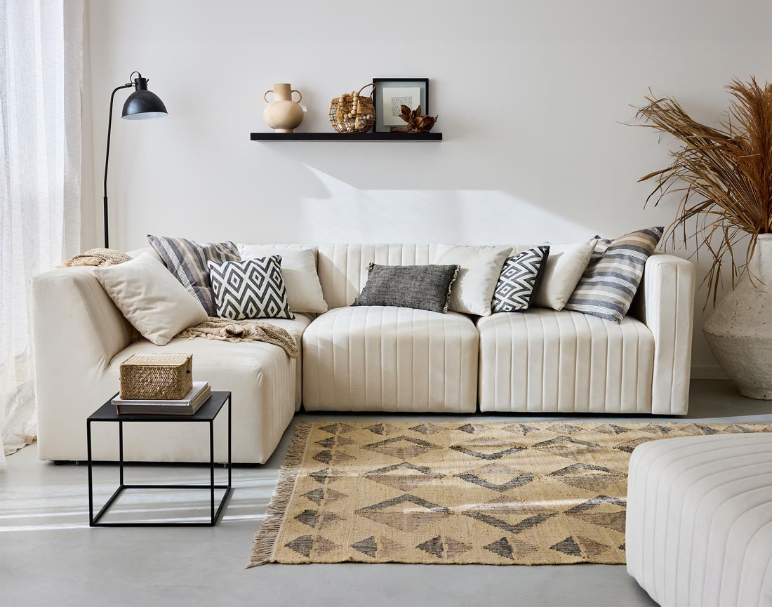 Canapé modulable d'angle gauche 5 places avec pouf d'appoint en velours Nova