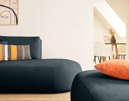 Canapé modulable d'angle gauche 4 places avec pouf en tissu texturé Santorini