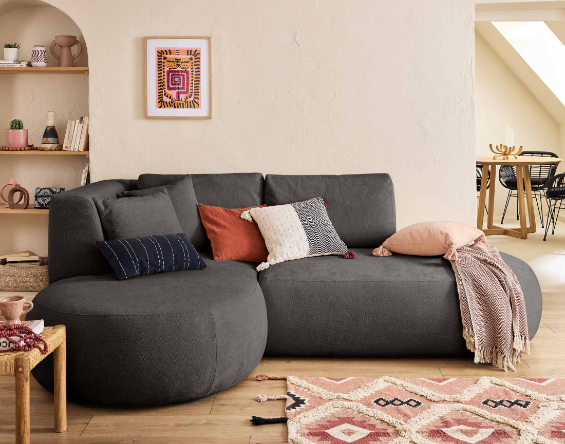 Canapé modulable d'angle gauche 4 places avec pouf en tissu texturé Santorini Canapé modulable d'angle gauche 4 places avec pouf en tissu texturé Santorini
