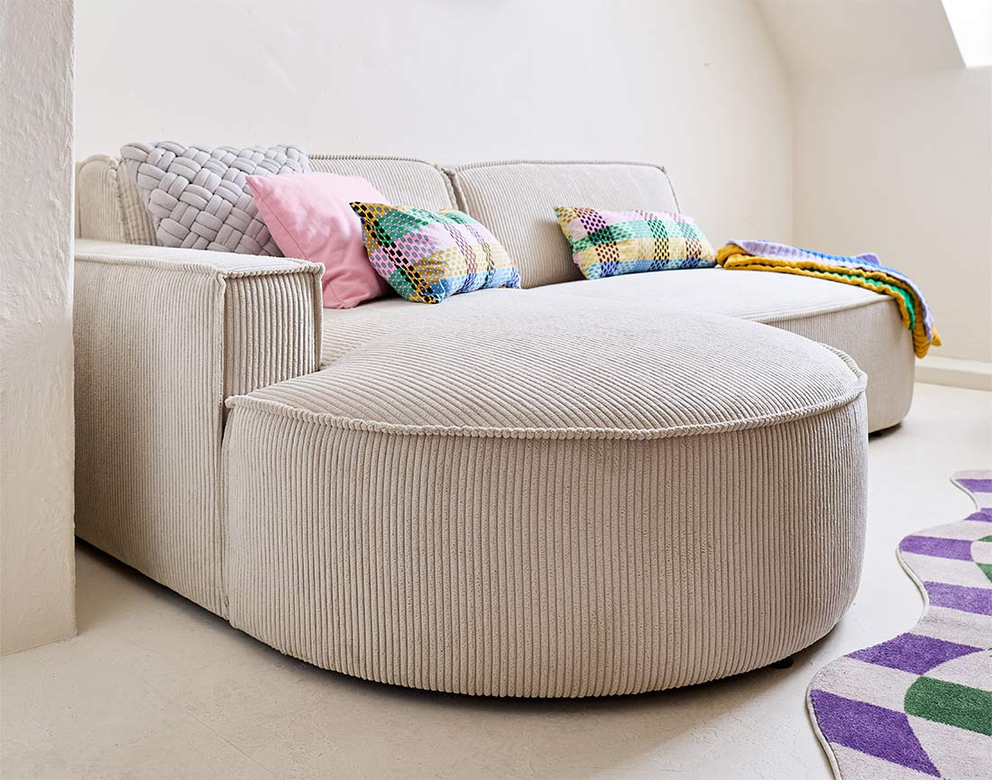 Canapé d'angle gauche aux formes arrondies 4 places en velours côtelé Spiaggia