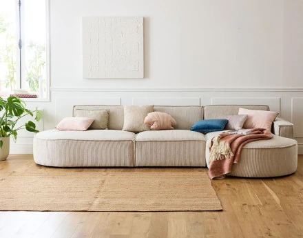 Canapé d'angle droit aux formes arrondies 5 places en velours côtelé Spiaggia