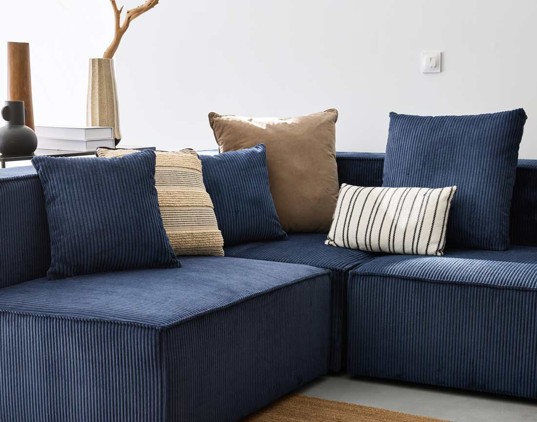 Canapé modulable panoramique 7 places en velours côtelé Colombine