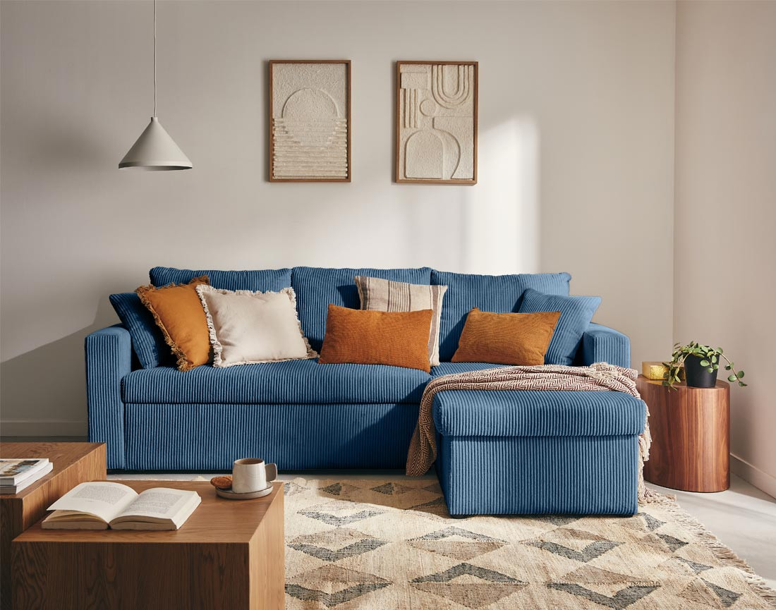 Canapé d'angle réversible 4 places convertible avec coffre en velours côtelé Cyrus