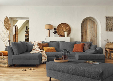 Canapé panoramique d'angle gauche 7 places avec pouf d'appoint en tissu bouclette Rune