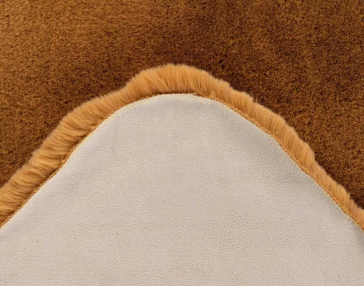 Tapis organique fausse fourrure orange Bear