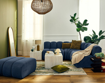 Canapé modulable d'angle réversible 4 places sans accoudoirs en tissu texturé Debbie