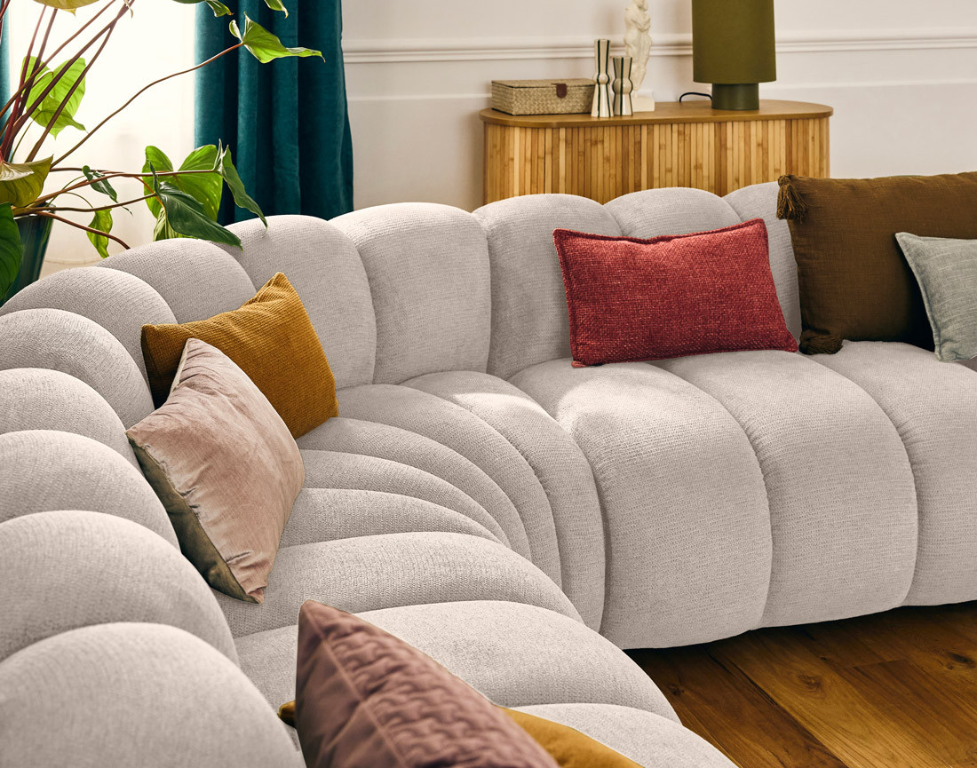 Canapé modulable d'angle droit 5 places en tissu texturé Debbie