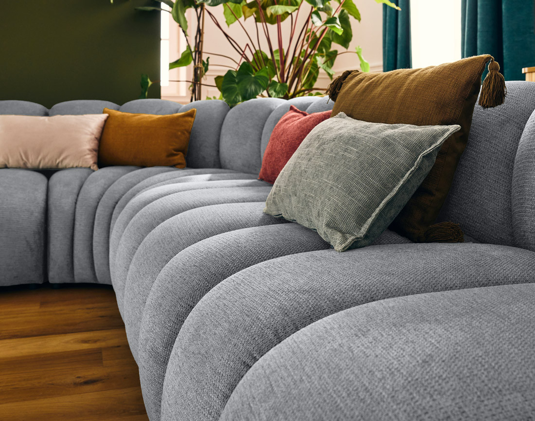 Canapé modulable d'angle droit 5 places en tissu texturé Debbie