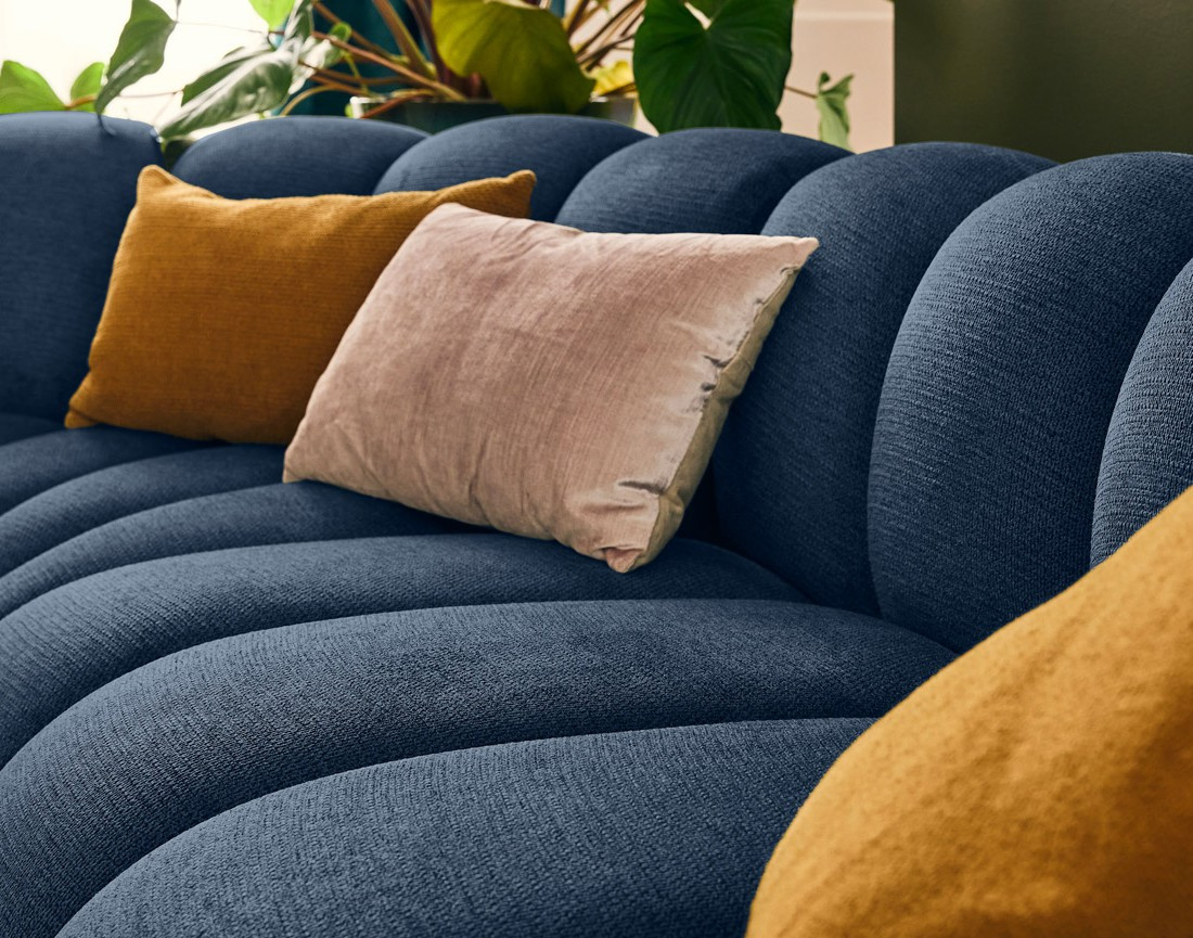 Canapé modulable d'angle gauche 5 places en tissu texturé Debbie