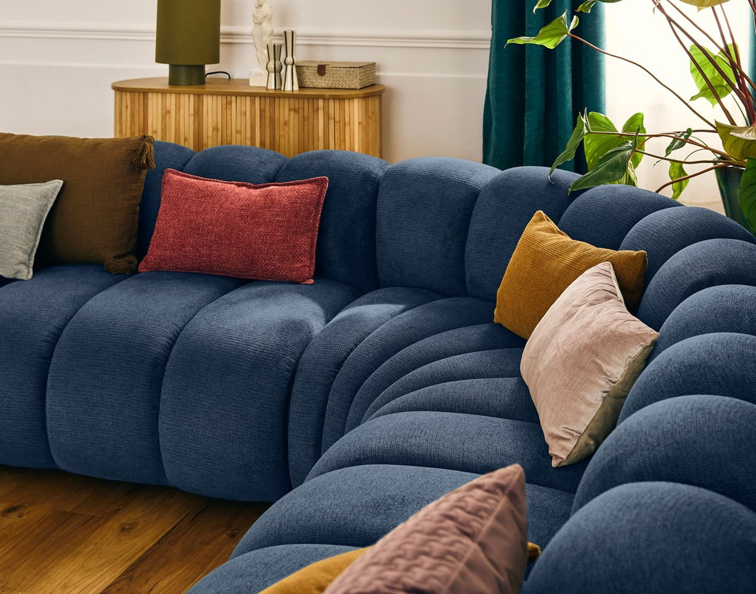 Canapé modulable d'angle gauche 5 places en tissu texturé Debbie