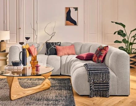 Canapé modulable d'angle droit 4 places avec accoudoir en tissu texturé Debbie