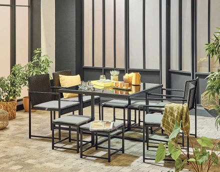 Ensemble table et chaises de jardin en acier noir 8 places coussins gris Olaria