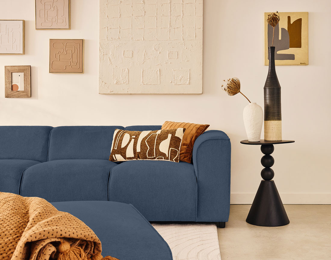 Canapé modulable d'angle gauche 5 places en tissu texturé Suaro