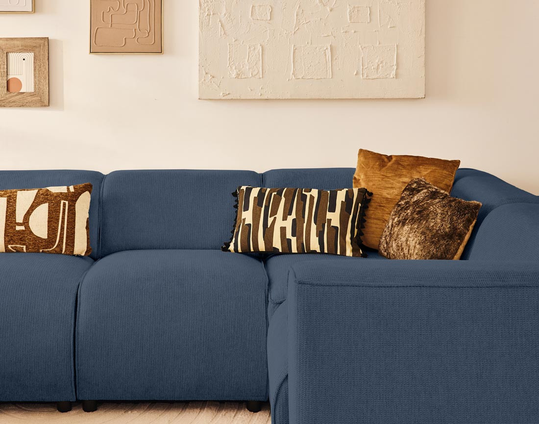 Canapé modulable panoramique d'angle droit 7 places en tissu texturé Suaro