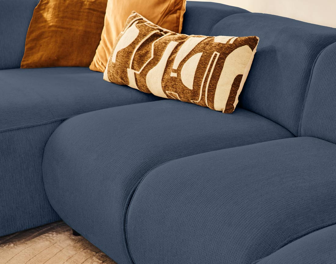 Canapé modulable panoramique d'angle droit 7 places en tissu texturé Suaro