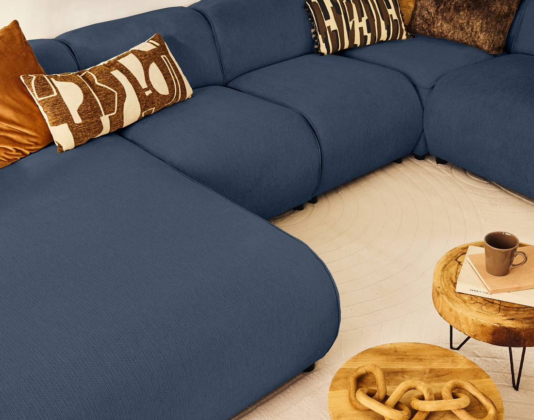 Canapé modulable panoramique d'angle droit 7 places en tissu texturé Suaro