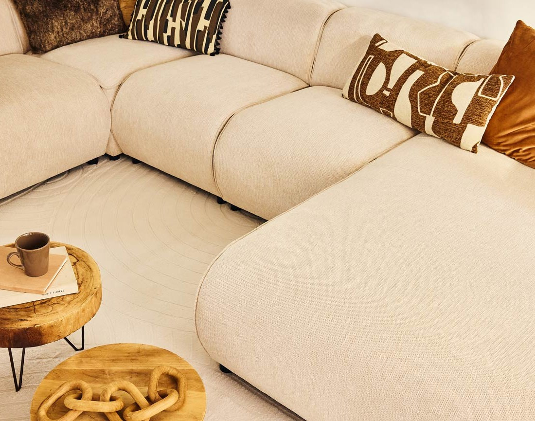 Canapé modulable panoramique d'angle gauche 7 places en tissu texturé Suaro Canapé modulable panoramique d'angle gauche 7 places en tissu texturé Suaro