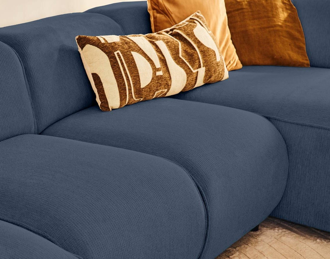 Canapé modulable panoramique d'angle gauche 7 places en tissu texturé Suaro