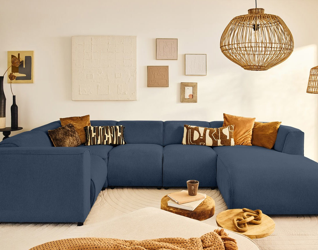 Canapé modulable panoramique d'angle gauche 7 places en tissu texturé Suaro