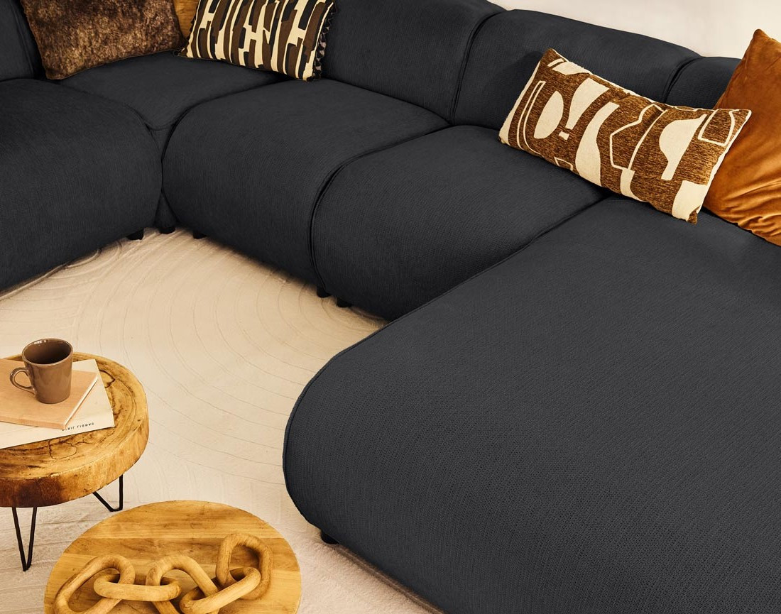 Canapé modulable panoramique d'angle gauche 7 places en tissu texturé Suaro Canapé modulable panoramique d'angle gauche 7 places en tissu texturé Suaro